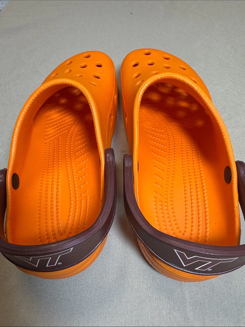 Men’s Orange Crocs Sandals with a Virginia Tech Maroon Strap